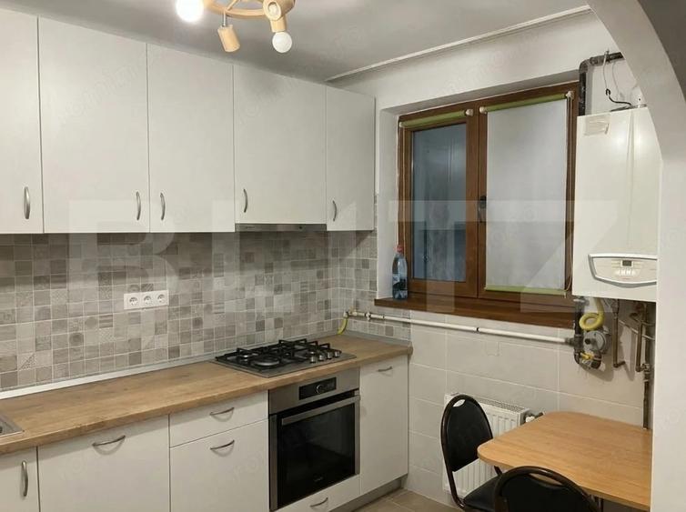 Apartament cu 2 camere semidecomandat, mobilat în Central