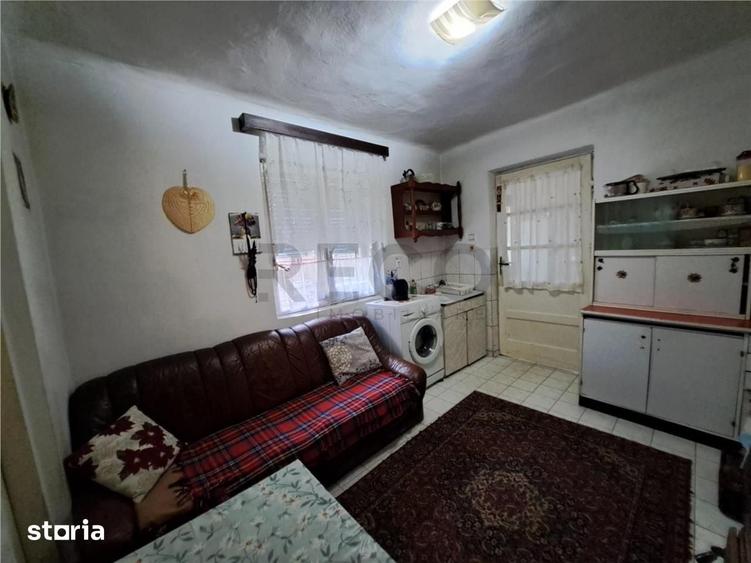 Casă cu 2 camere decomandat cu Teren 257 Mp în Sânmartin