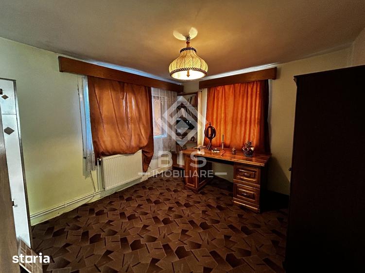Casă cu 4 camere cu Teren 2600 Mp în Central