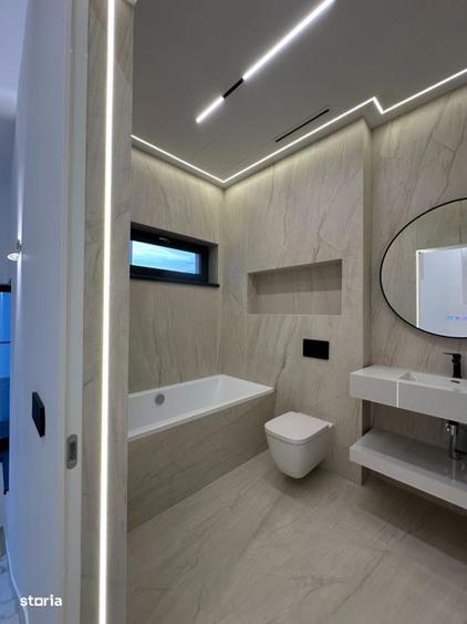 Casă cu 5 camere cu Teren 490 Mp în Tunari