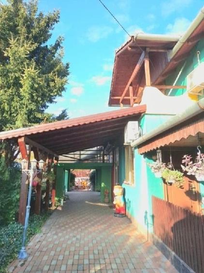 Casă individuală cu 5 camere cu Teren 750 Mp în Central