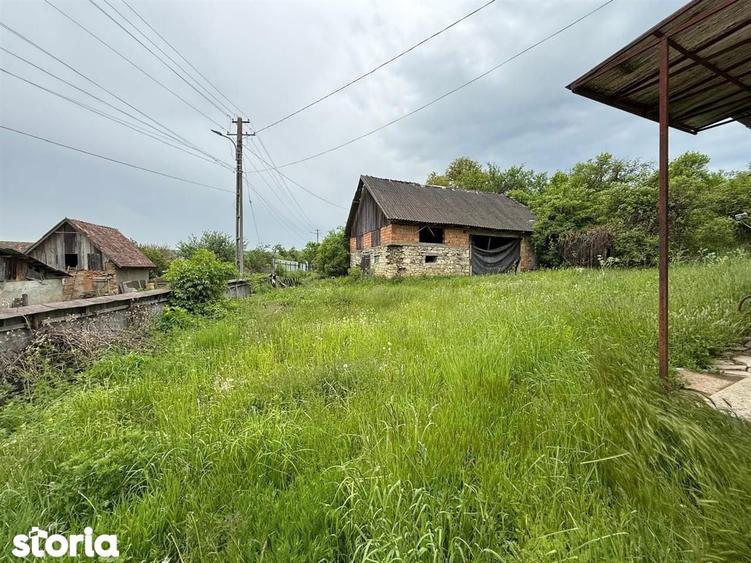 Casă cu 2 camere cu Teren 6600 Mp în Așchileu