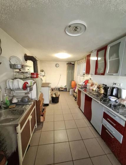 Casă cu Teren 5000 Mp în Central
