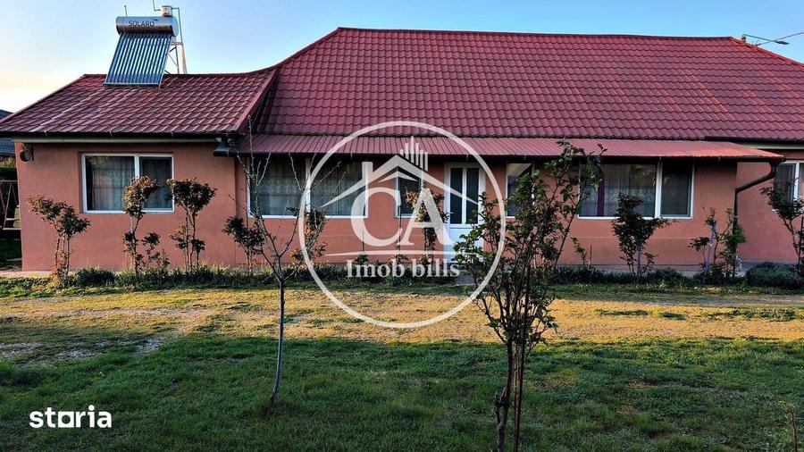Casă cu 5 camere semidecomandat cu Teren 2000 Mp în Sânmartin