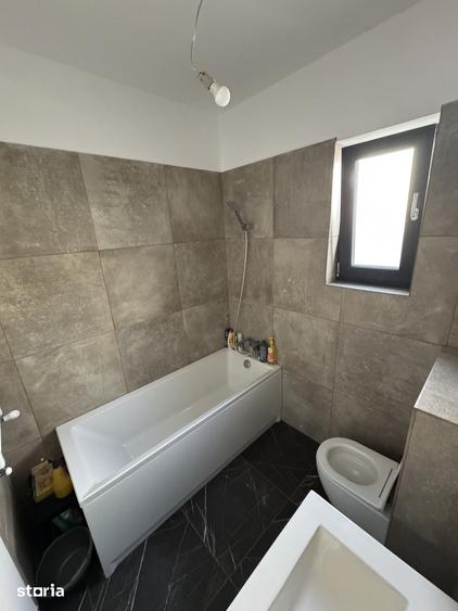 Casă cu 4 camere cu Teren 370 Mp în Tunari