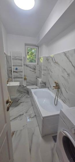Apartament cu 2 camere semidecomandat, mobilat în Take Ionescu
