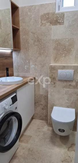 Apartament cu 2 camere semidecomandat, mobilat în Central