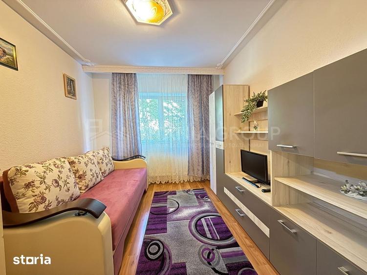 Apartament cu 2 camere, 2 bai, decomandat, etaj 1 - zona Racadau - 5