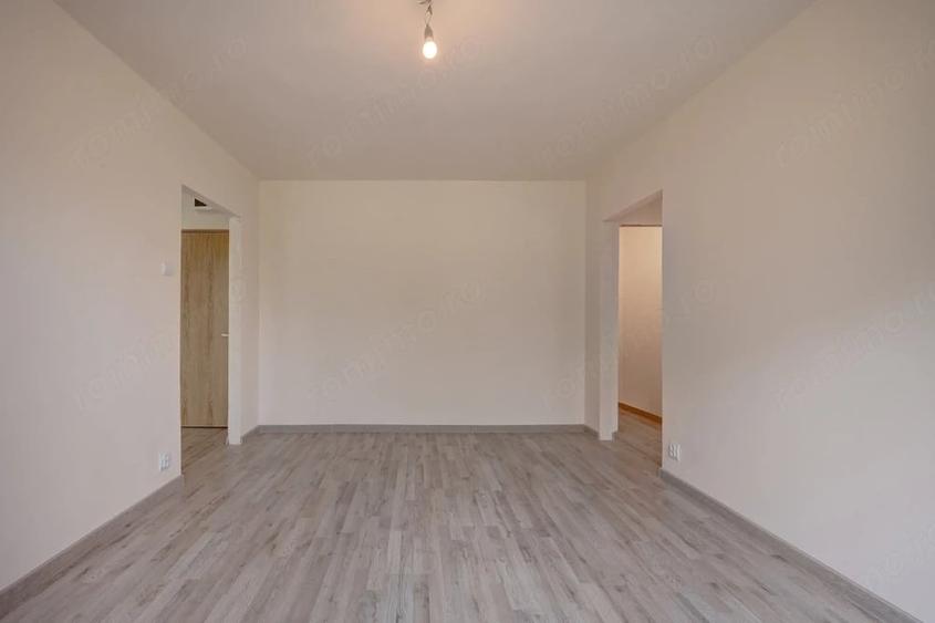 Apartament cu 3 camere semidecomandat în Baba Novac