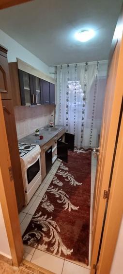 Apartament cu 2 camere decomandat în Podu Roș