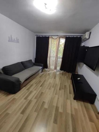 Apartament cu 2 camere semidecomandat, mobilat în Costin Georgian