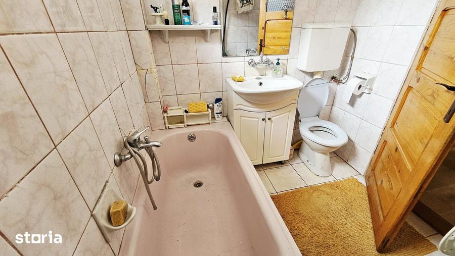 Casă cu 4 camere cu Teren 400 Mp în Central