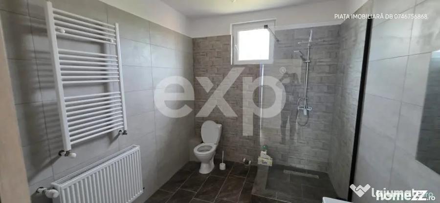 Casă cu 8 camere cu Teren 1388 Mp în Voinești