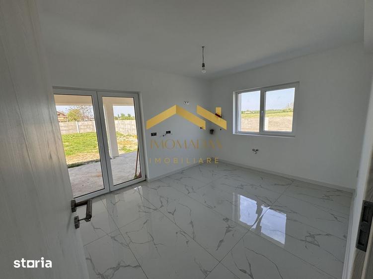 Casă cu 5 camere cu Teren 400 Mp în Bucovăț
