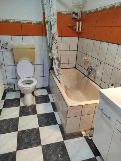 Casă cu 4 camere cu Teren 1000 Mp în Central