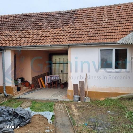 Casă cu 5 camere cu Teren 1611 Mp în Răbăgani