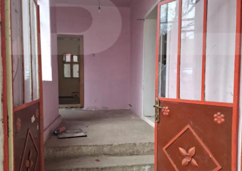 Casă cu 4 camere cu Teren 1000 Mp în Central