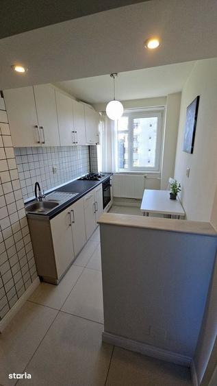 Apartament cu 3 camere semidecomandat, mobilat în Titan