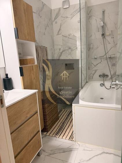 Apartament cu 2 camere semidecomandat, mobilat în Mihai Bravu