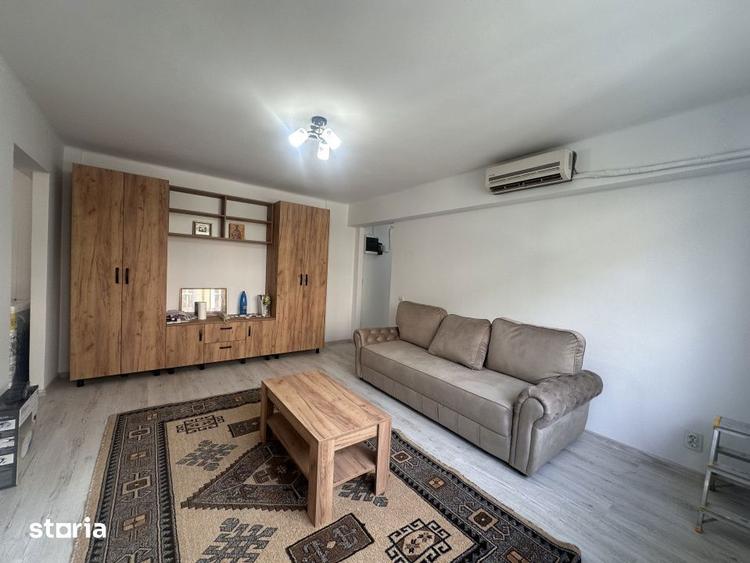 Apartament cu 2 camere semidecomandat, mobilat în Central