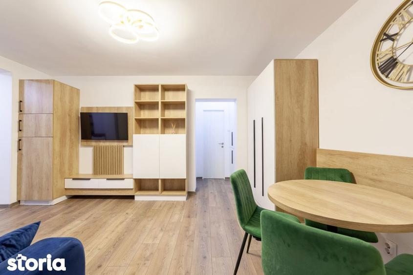 Apartament cu 3 camere semidecomandat, mobilat în Calea București