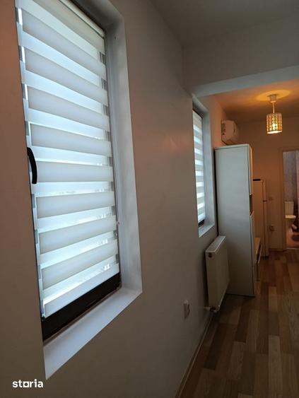 Apartament cu 2 camere semidecomandat, mobilat în Podu Roș