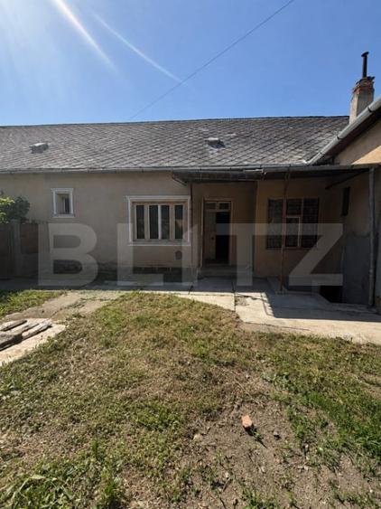 Casă cu 3 camere cu Teren 142 Mp în Central