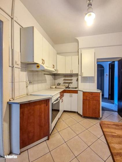 Apartament cu 4 camere decomandat în Romană