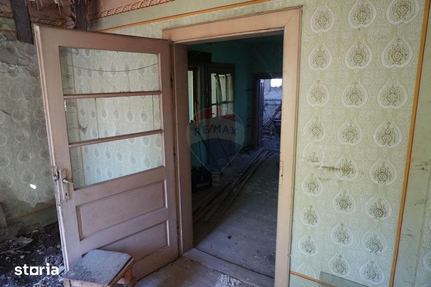 Casă cu 2 camere cu Teren 1958 Mp în Tisa