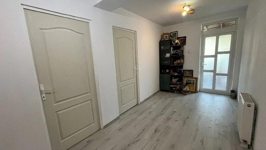 Apartament cu 4 camere decomandat în Bucium