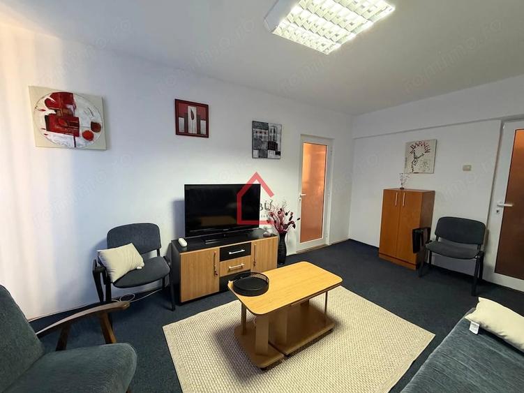 Apartament cu 3 camere decomandat în Filiași