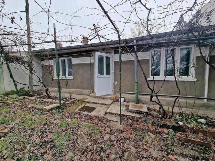 Casă cu Teren 1400 Mp în Central