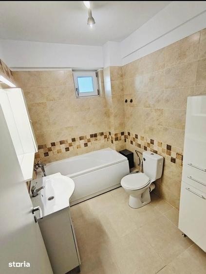 Apartament cu 2 camere decomandat în Podu Roș