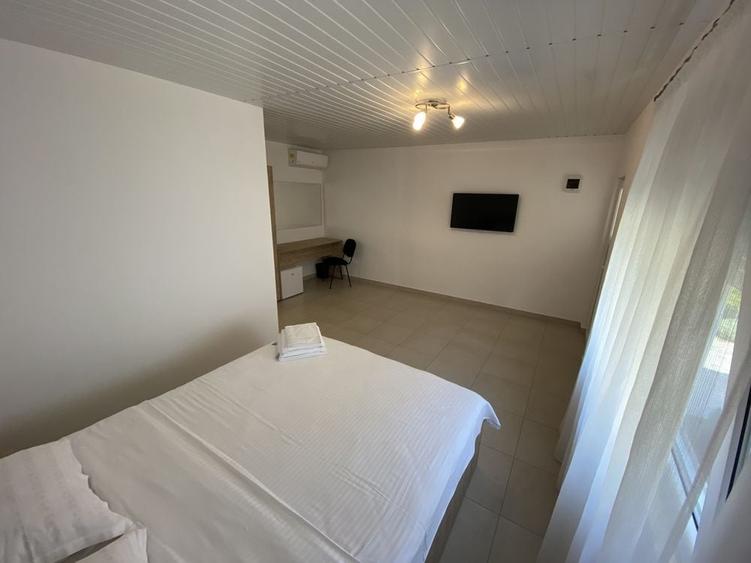 Casă cu 4 camere cu Teren 1400 Mp în Central