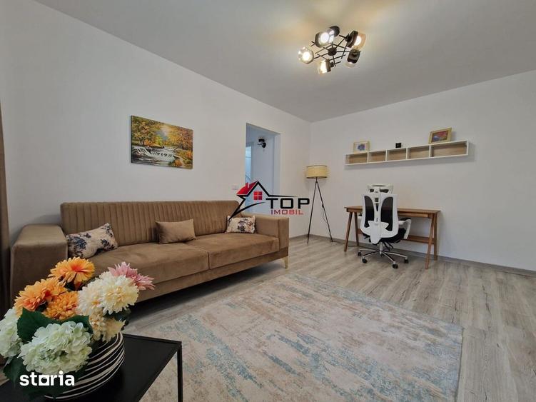 Apartament cu 2 camere semidecomandat, mobilat în Podu Roș