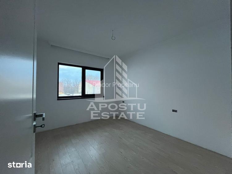 Duplex cu 4 camere, 3 bai,teren 250 mp in zona Dambovita