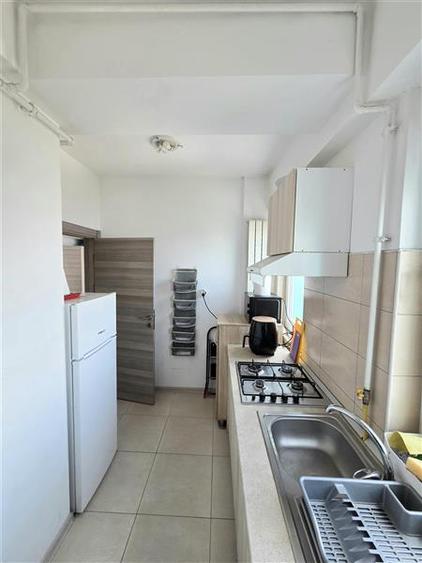 Apartament cu 2 camere semidecomandat, mobilat în Central