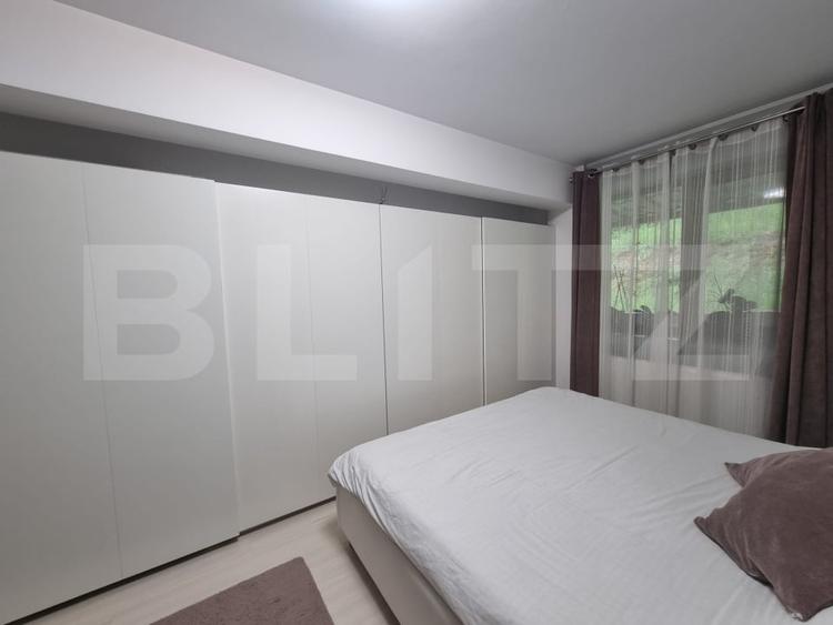 Apartament cu 2 camere semidecomandat, mobilat în Baciu