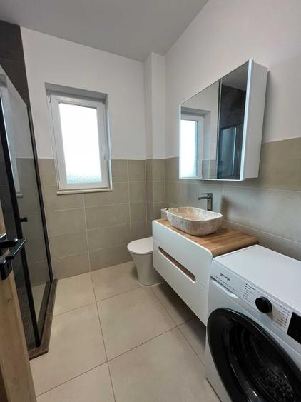 Apartament cu 2 camere decomandat în Tractorul