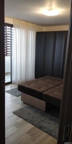 Apartament cu 2 camere semidecomandat, mobilat în Central