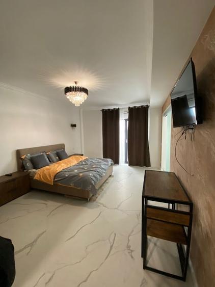 Apartament cu 4 camere decomandat, mobilat în Exterior Est