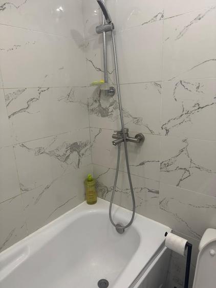 Apartament cu 3 camere semidecomandat în Ozana