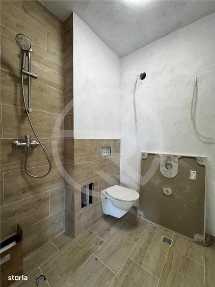 Apartament cu 3 camere semidecomandat în Borhanci