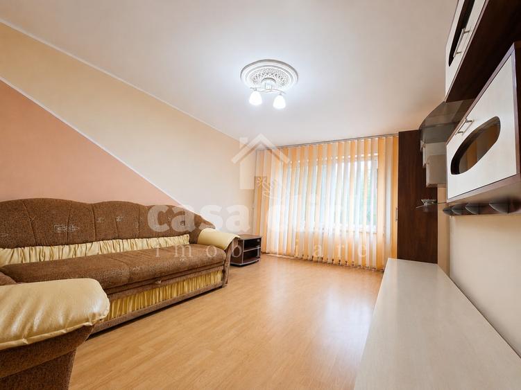 Apartament cu 3 camere decomandat în