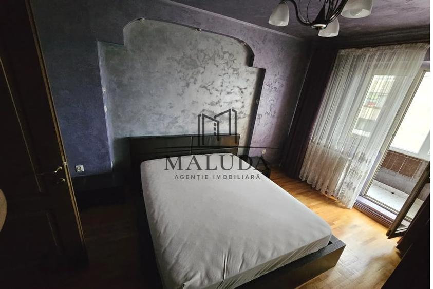Apartament cu 3 camere decomandat în Calea București
