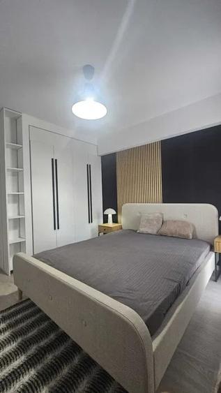 Apartament cu 2 camere semidecomandat, mobilat în Costin Georgian