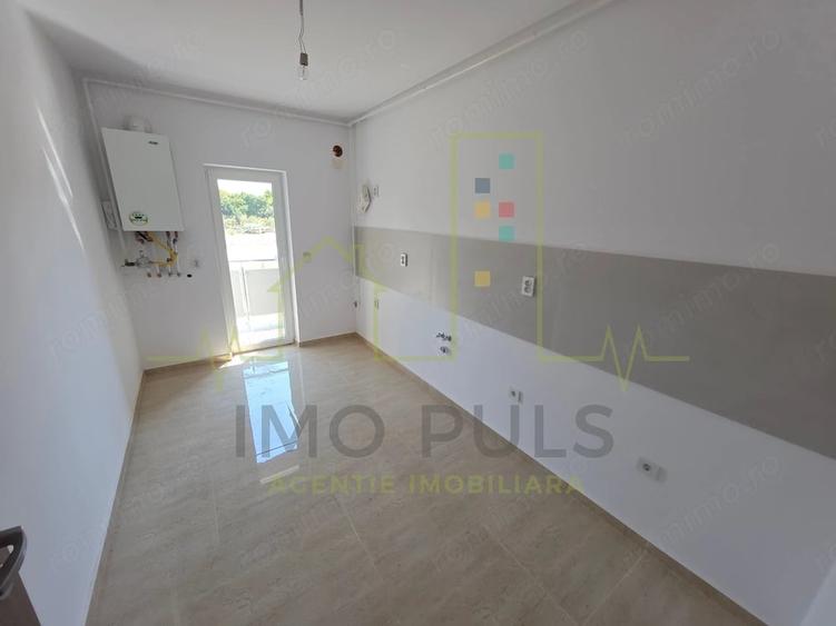 Apartament la parter cu balcon. Bucatarie separata. Loc de parcare - 3