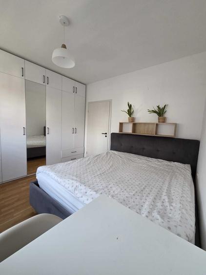Apartament cu 2 camere semidecomandat în Chinteni