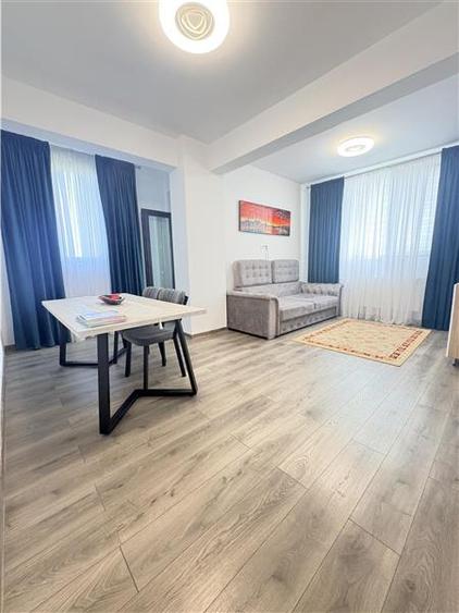 Apartament cu 2 camere semidecomandat, mobilat în Km 5