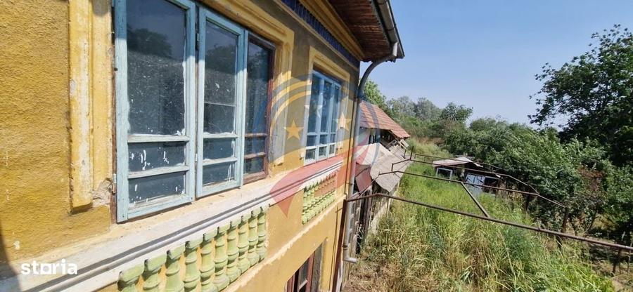 Casă cu 4 camere în Bâzdâna